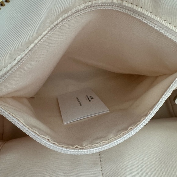 Coach Signature Light Khaki Zip Tote with three inside pockets 17”W x 11”H x 6”D - Picture 12 of 17